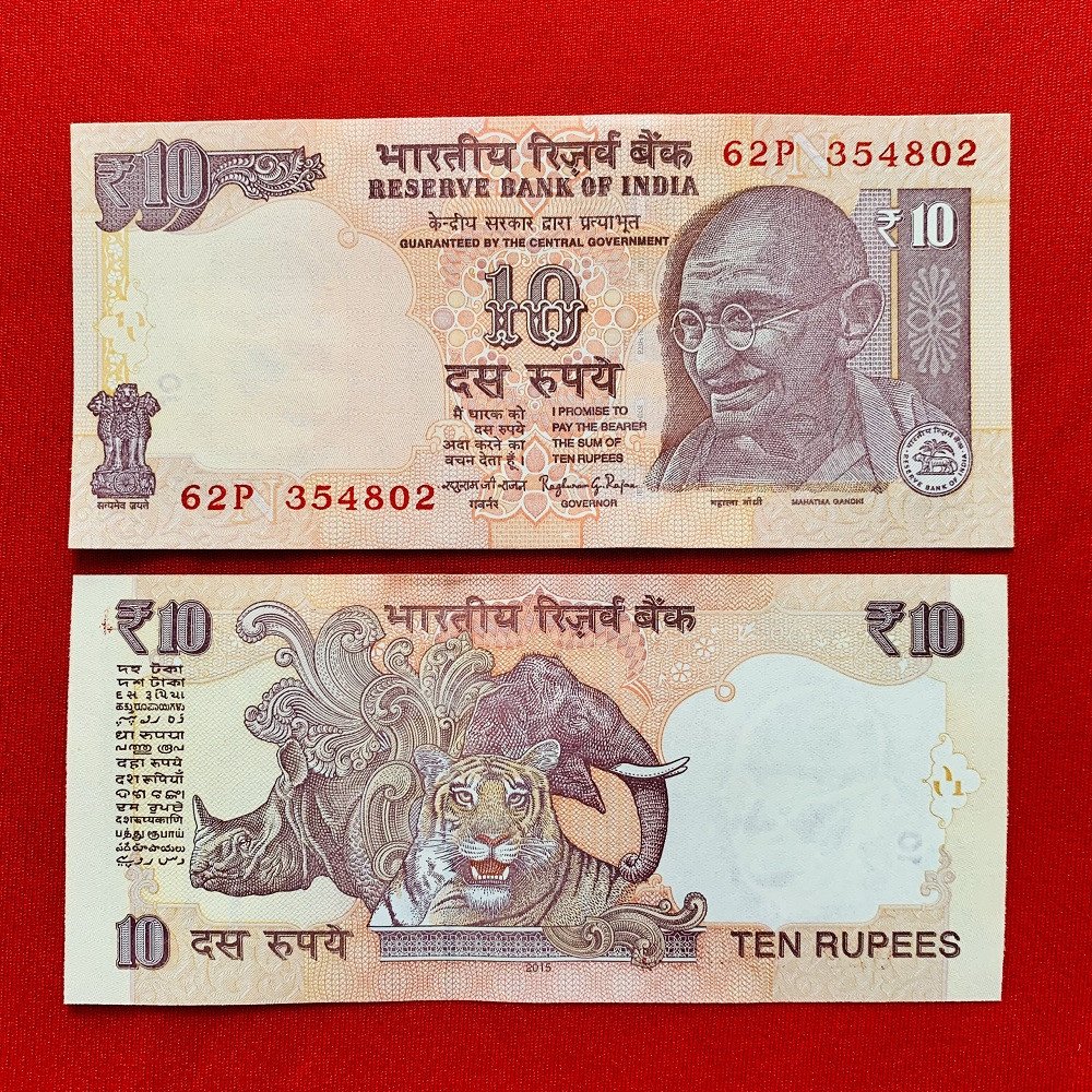 Cận cảnh mặt trước và mặt sau của tờ 10 Rupee Ấn Độ, thể hiện giá trị và văn hóa