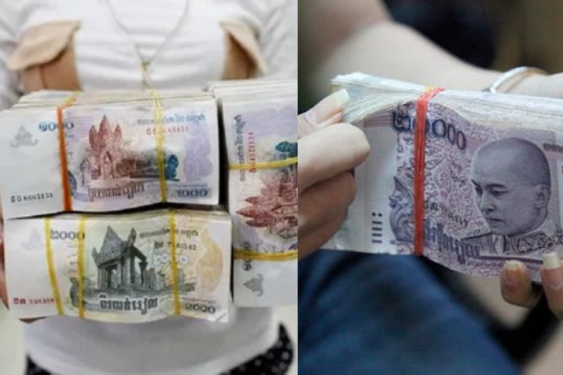 Kiểm tra kỹ lưỡng các tờ tiền Riel Campuchia sau khi quy đổi để tránh rủi ro